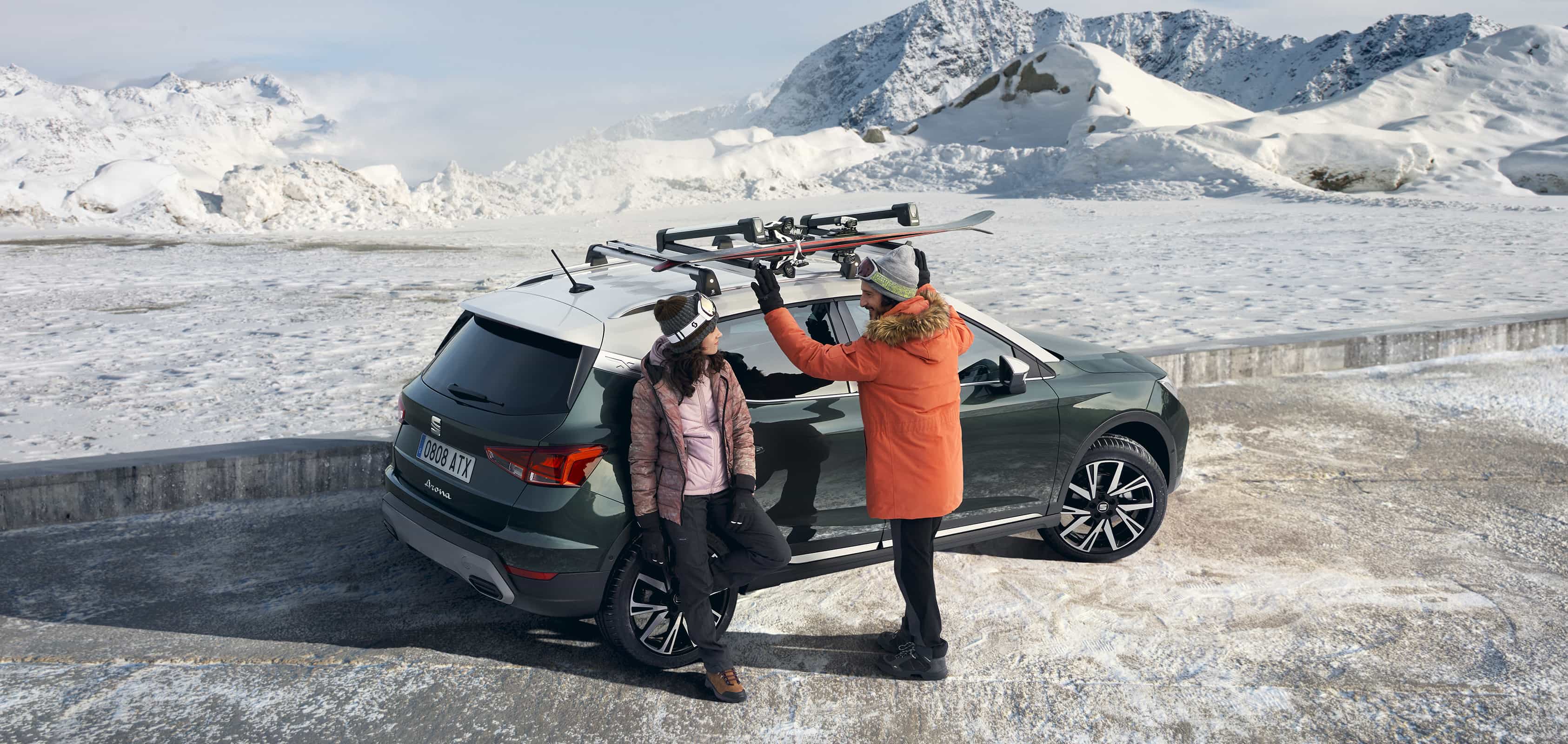 SEAT Arona dark camouflage with roof rack car