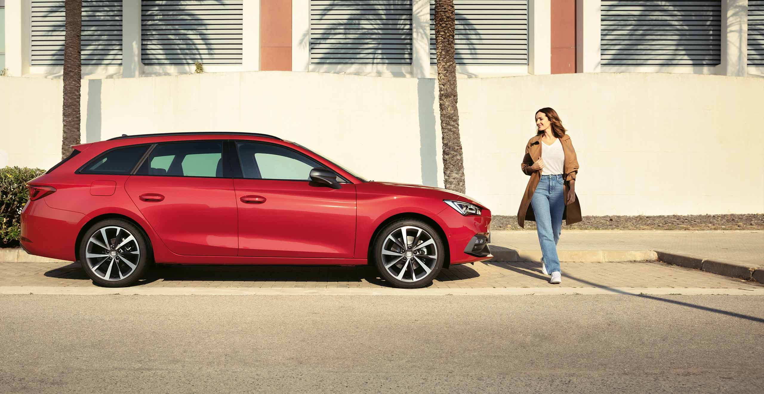 SEAT Leon Sportourer pure red colour with 18” performance machine alloy wheels